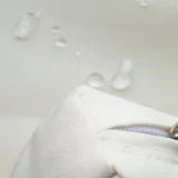 15572